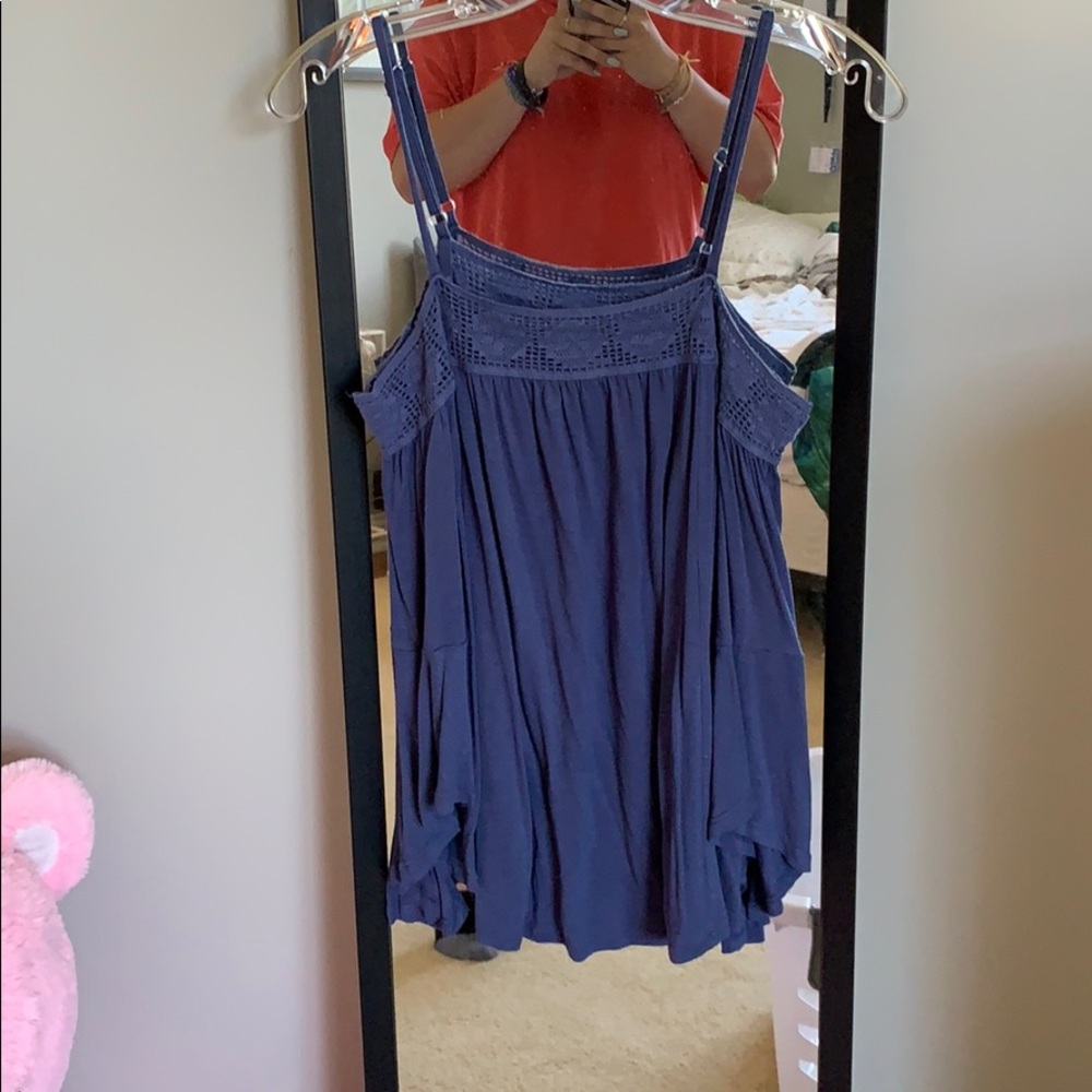 off the shoulder blue bell sleeved shirt